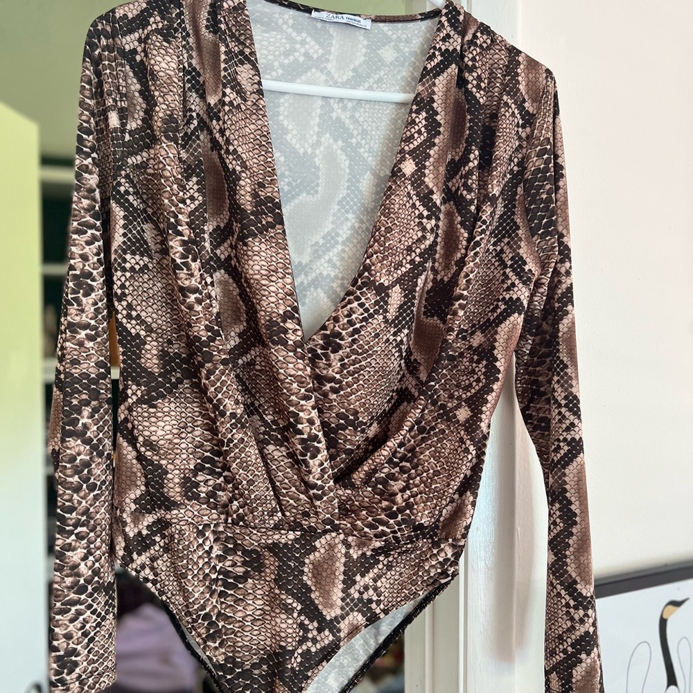 Gorgeous Zara bodysuit  in animal print pattern.
